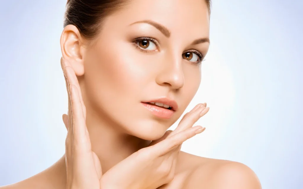 Woman with smooth skin after facial rejuvenation treatment